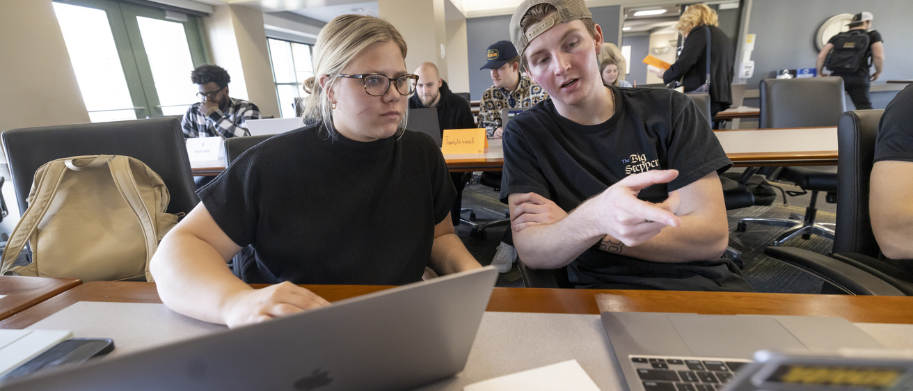 students working on a group project in classroom